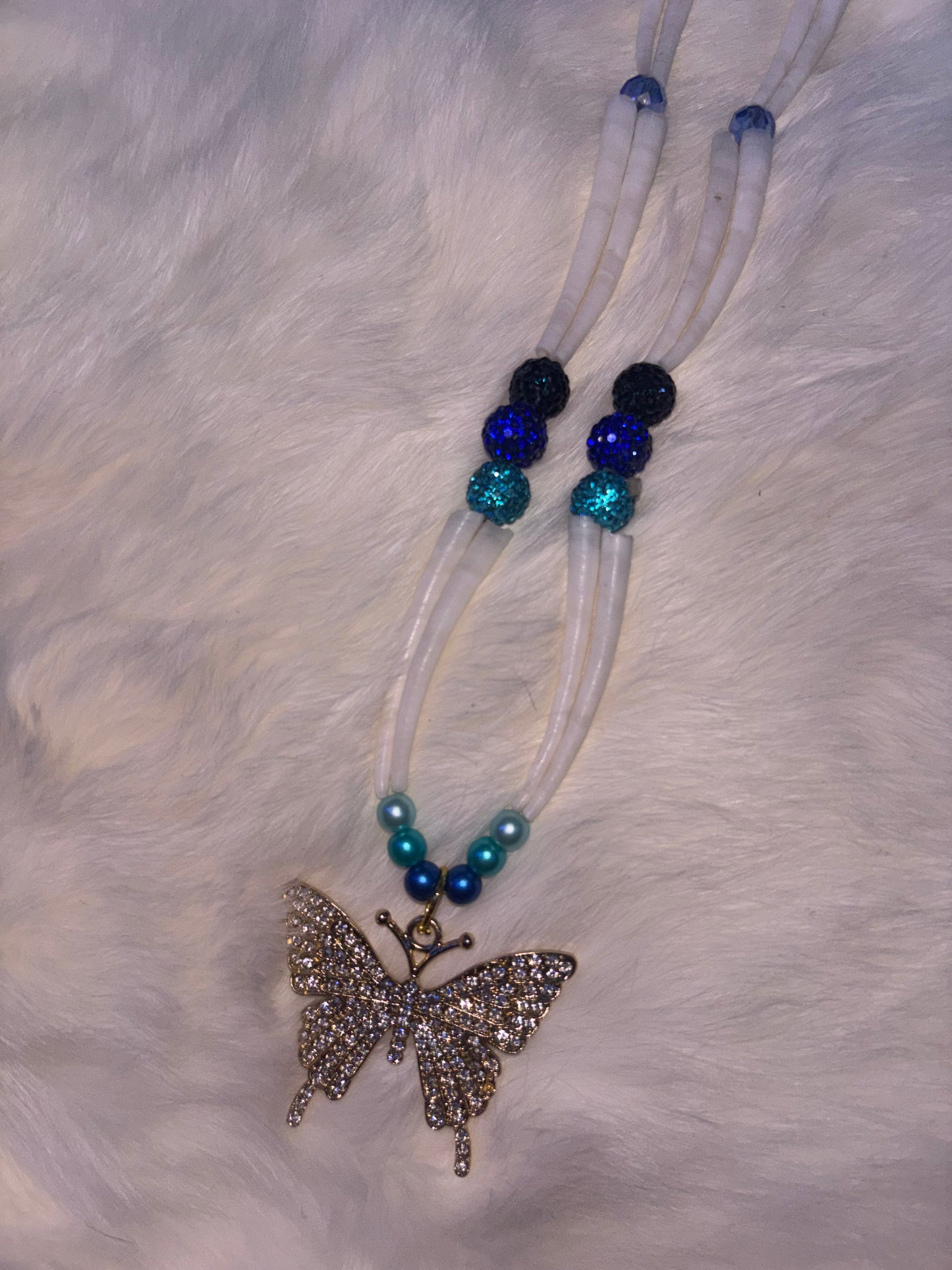 Blue butterfly necklace